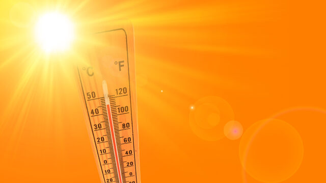 Orange illustration representing the hot summer sun and the environmental thermometer that marks a temperature of 45 degrees